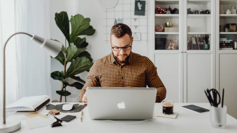 a man working at a laptop