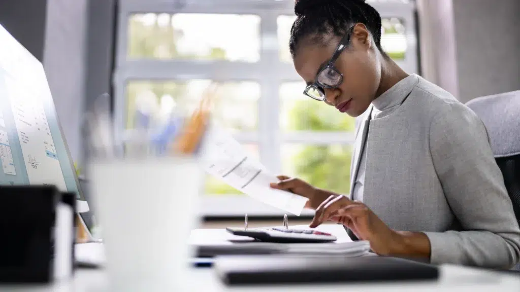 a young lady sorting out paperwork