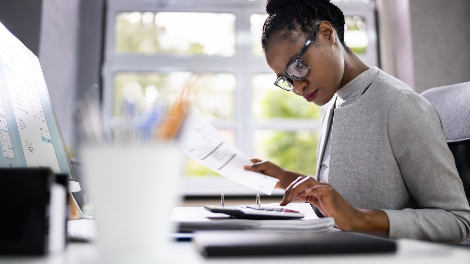 a young lady sorting out paperwork