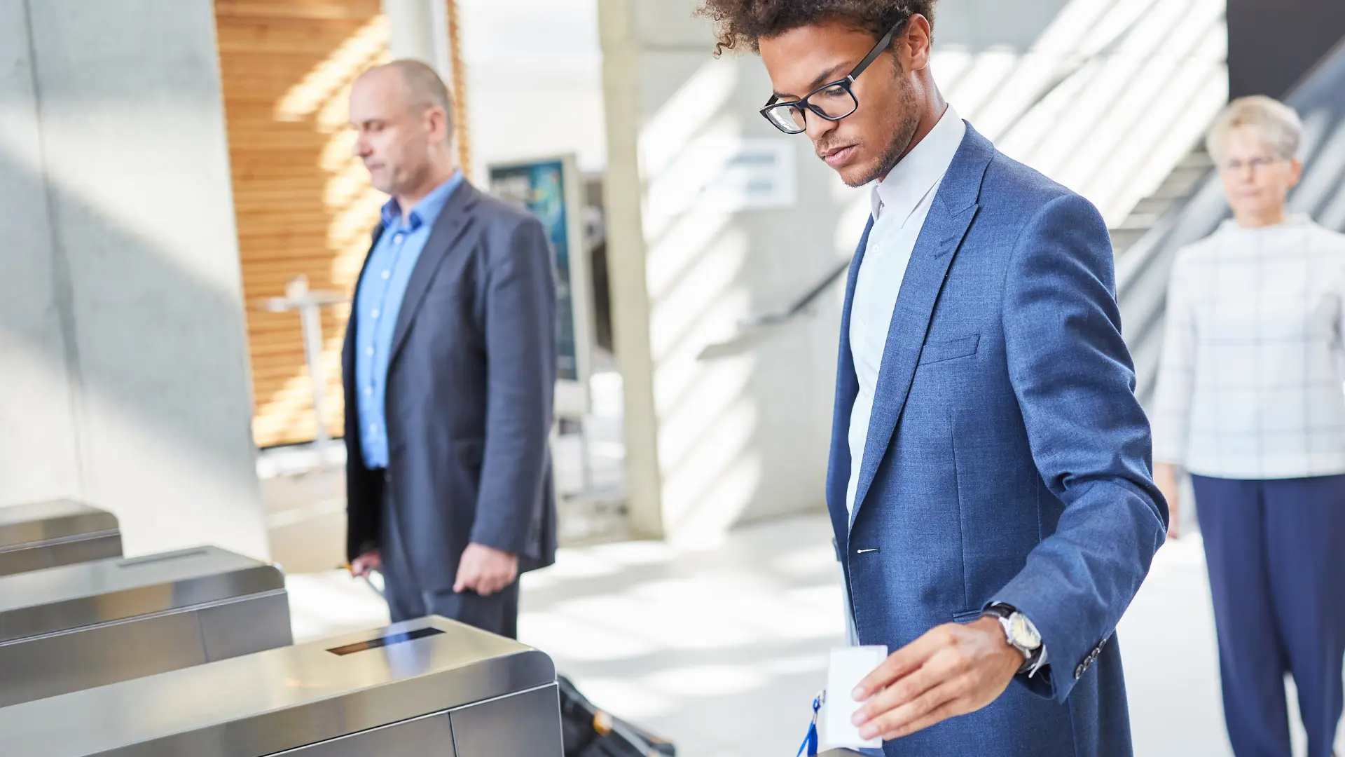 a person accessing a building with a card
